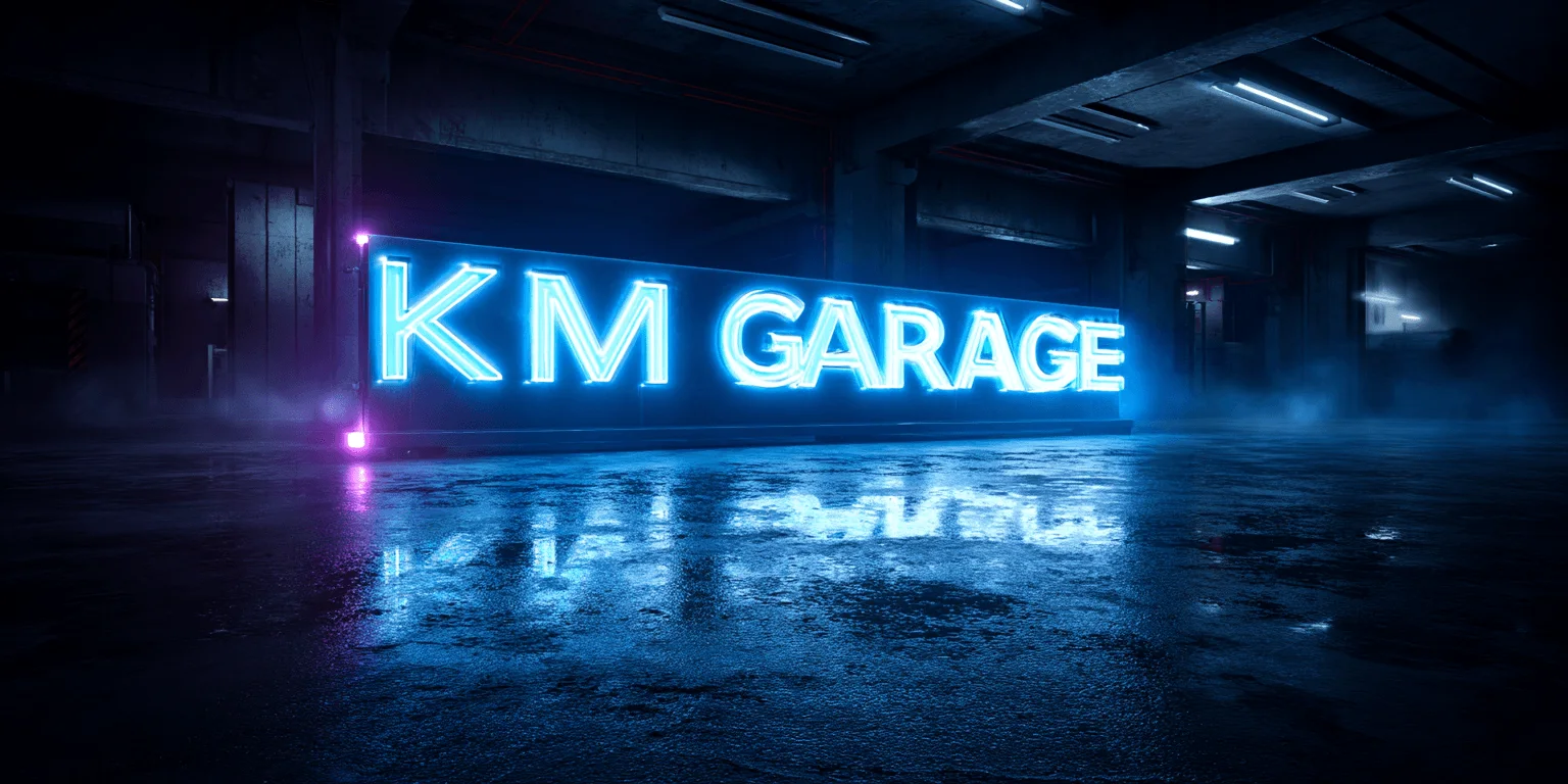 KM Garage illuminated sign inside a blue-lit automotive workshop